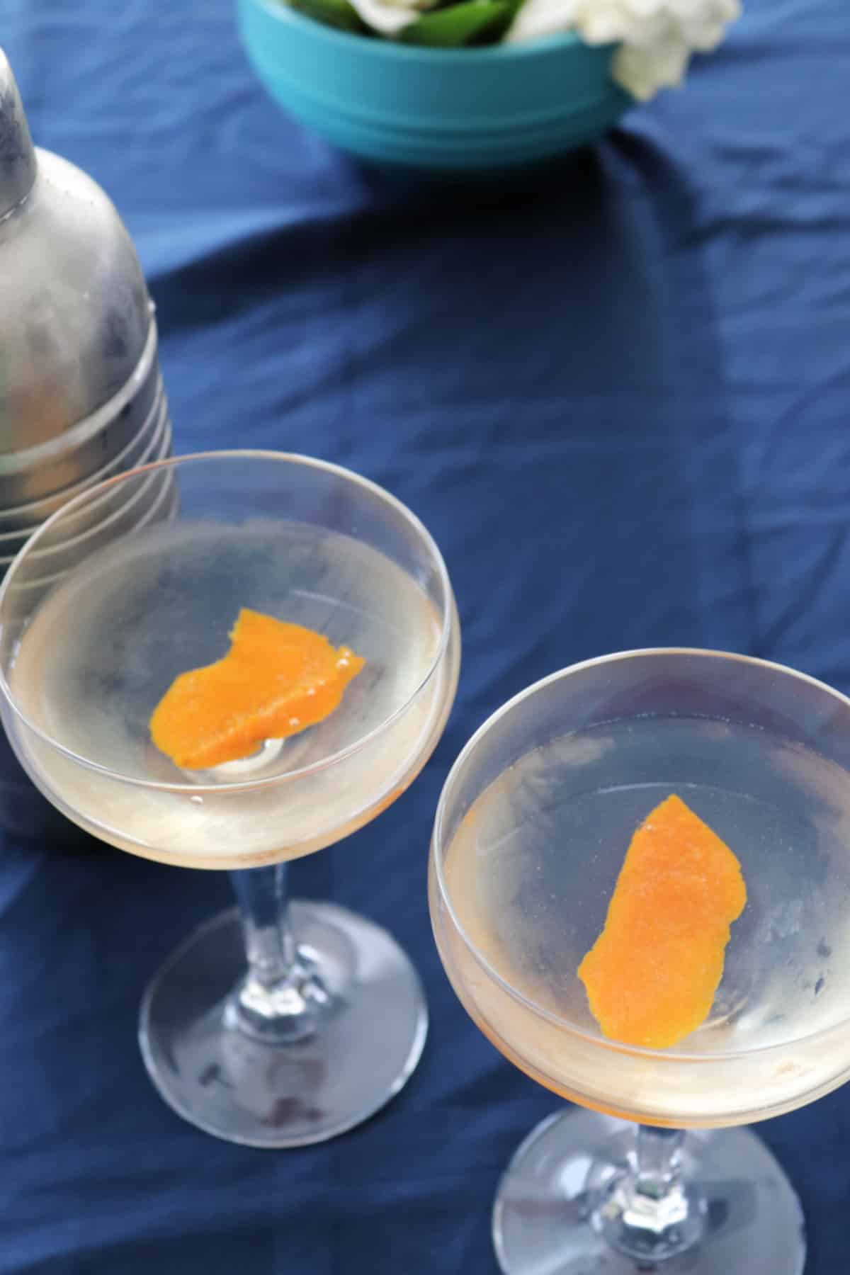 Overhead view of two glasses of sake martinis.